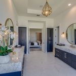 symmetrical vanity areas in master bathroom
